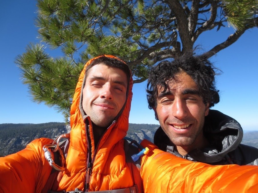 Hamik and Vitaliy standing in front of the El Cap Tree looking tired.